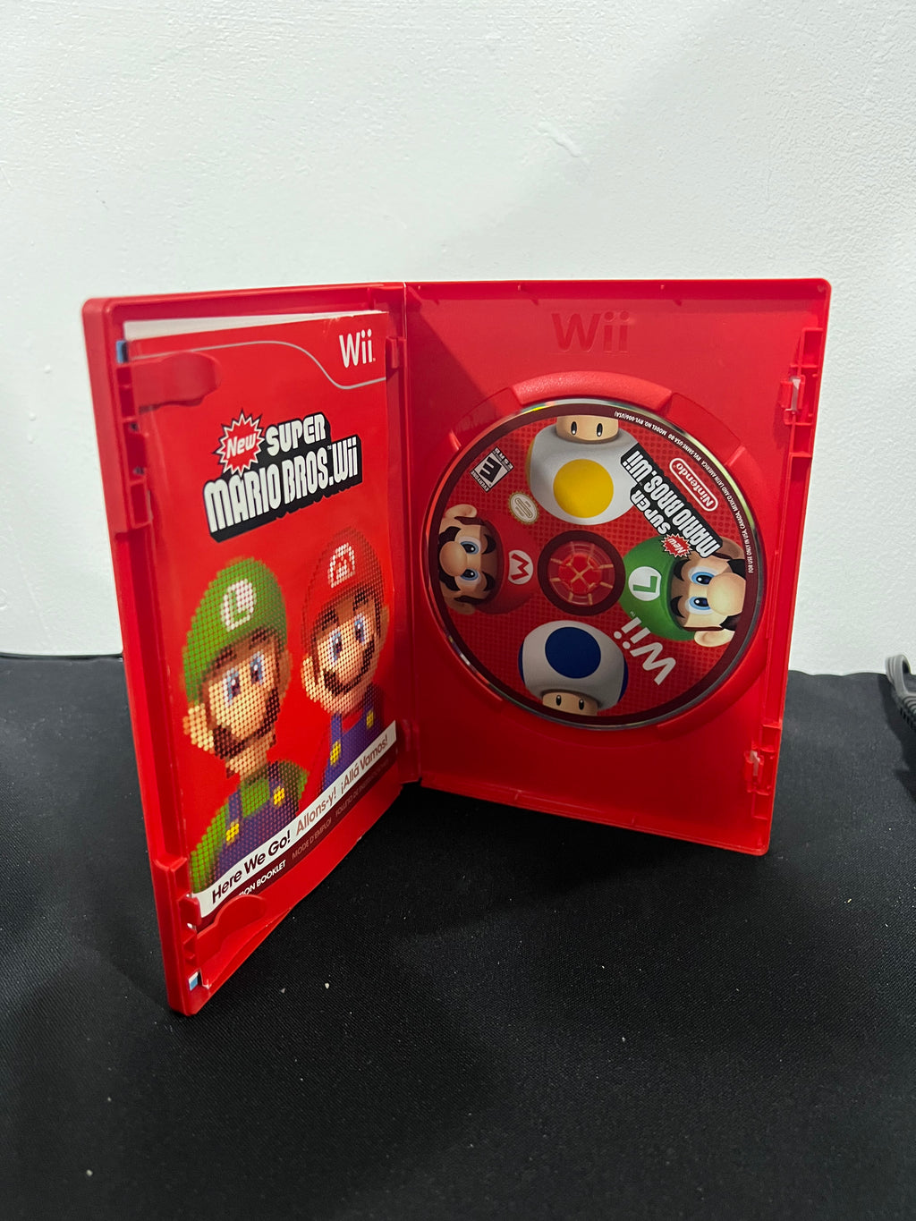 New Super Mario Bros Wii completo incluye su manual