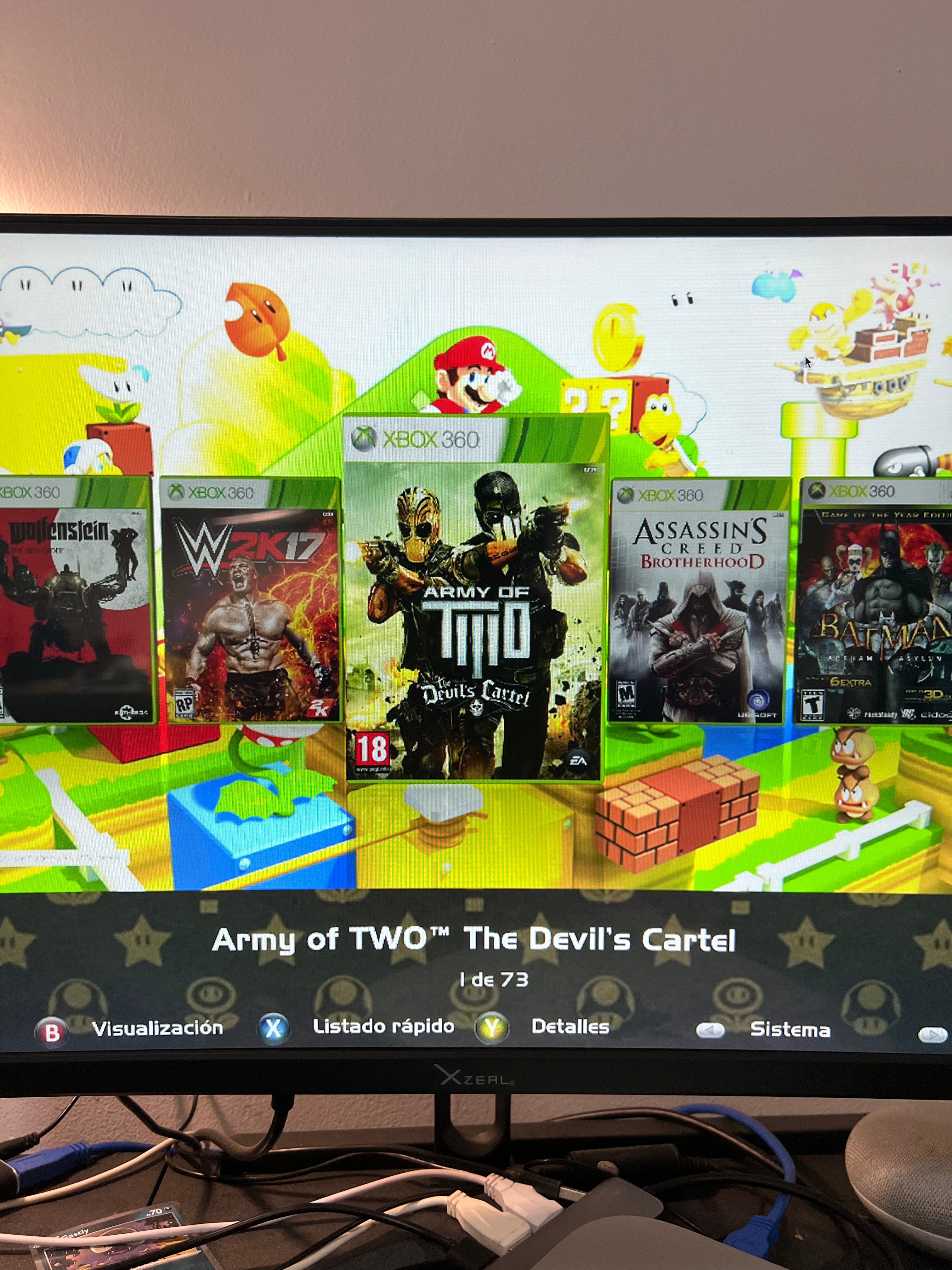 Xbox 360 Slim con juegos (incluye control y cables)
