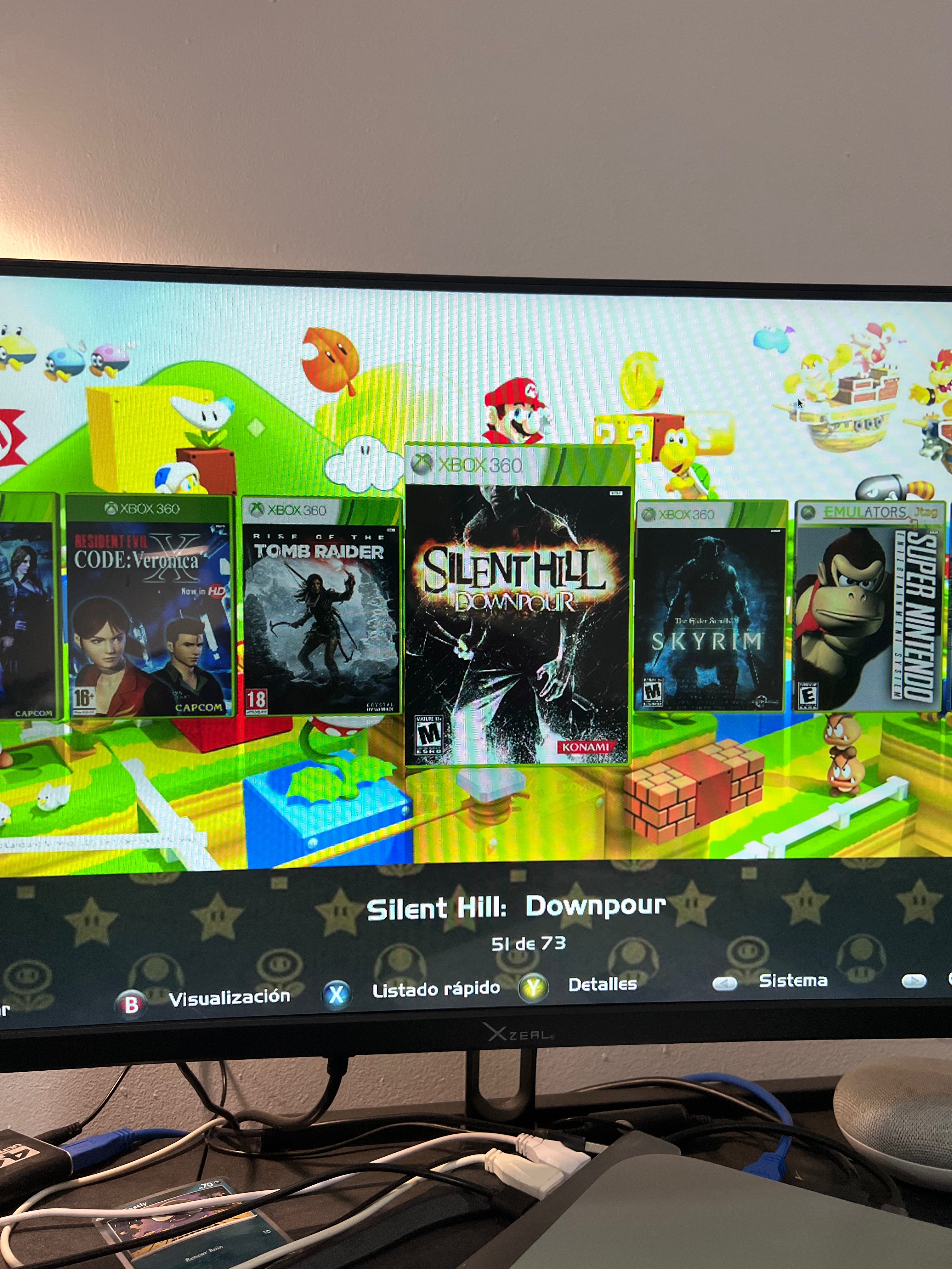 Xbox 360 Slim con juegos (incluye control y cables)