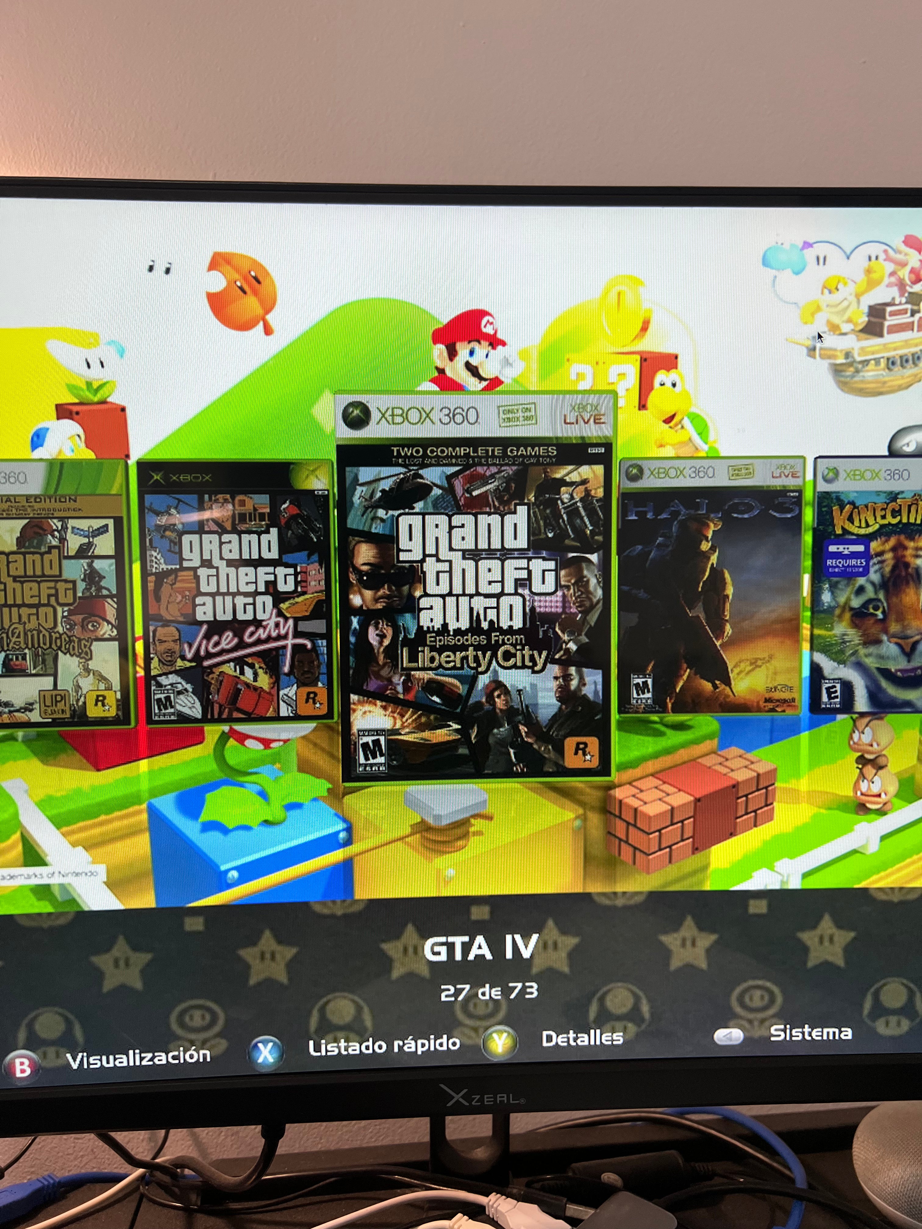 Xbox 360 Slim con juegos (incluye control y cables)
