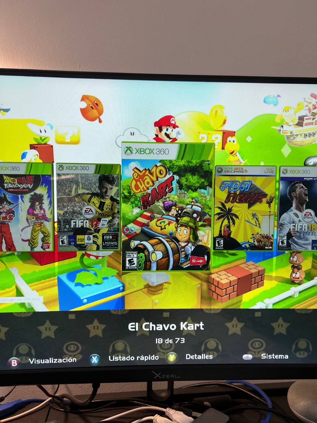 Xbox 360 Slim con juegos (incluye control y cables)